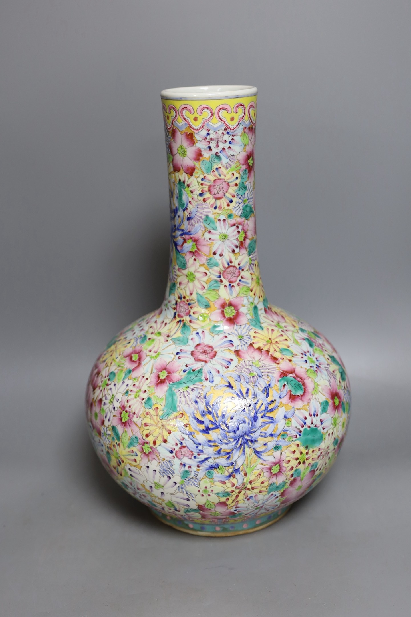 A Chinese famille rose millefleur vase, 40cms high.